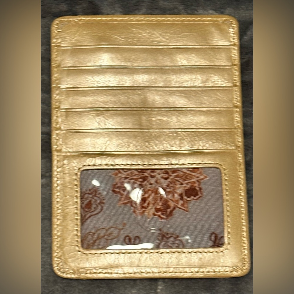 NWOT HOBO card holder mine is gold the black one is for information only.